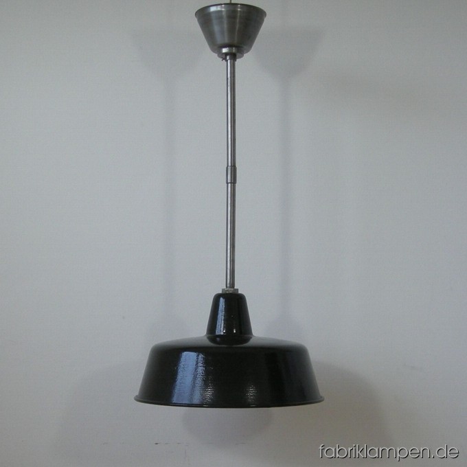 Black enameled industrial lamp. Material: enameled sheet with iron suspension. Without socket – for the socket there is a threaded tube (M10) in the lamp, for 20 EUR additional price we can electrify the lamp. Total height: as on the pictures: 72 cm (28,3 inches), the height can be increased or reduce. Height of the lamp shade ca. 17 cm (6,7 inches), diameter of the lamp ca. 36 cm (14,2 inches).