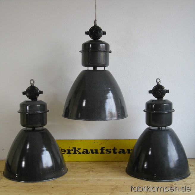 Huge industrial lamps. Material: black (grayish) enameled sheet, aluminium. The lamps are cleaned, and newly electrified, with E40 sockets -  adapters for E27 are inclusive, so the lamps can be used with E27 bulbs. Total height: ca. 76 cm (30 inches). Diameter of the shade ca. 53 cm (21 inches).
