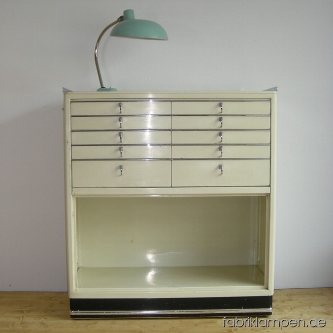 Old Baisch medical chest of drawers. The doors are missing. Width ca. 98 cm (38 inches), height ca. 109,5 cm (43 inches).