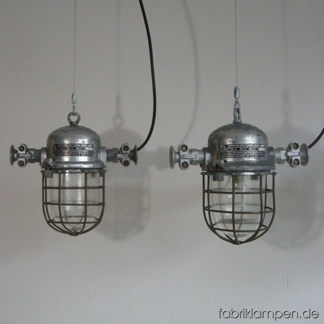 Nice industrial lamp (bully). Material: aluminum, steel, glass. We have 20 pieces on stock. The lamps are cleaned, and newly electrified, with ca. 2 m wire. Total height: ca. 30 cm (11,8 inches).