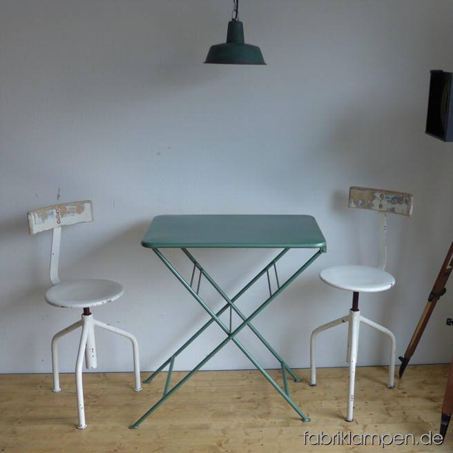 Old green metal tables in very nice original condition. Table surface ca. 73 x 52 cm (28,7 x 20,5 inches), height ca. 82 cm (32,3 inches).