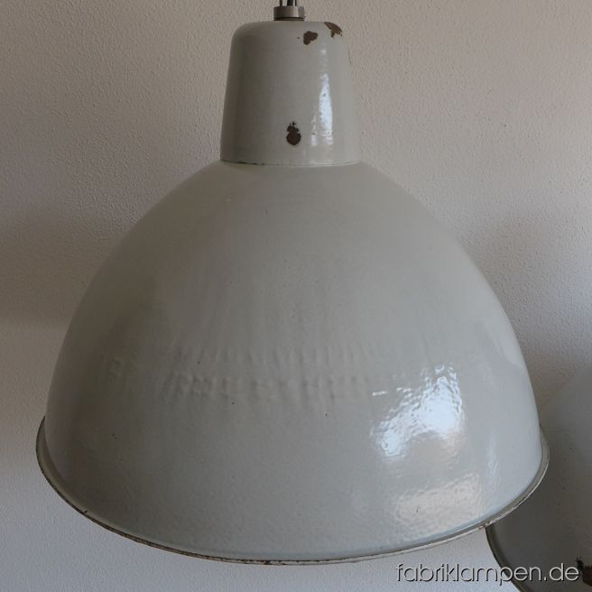 Rare big gray enamel lamps with enameled shades. Material: gray enameled sheet. Newly electrified, with E27 sockets. Height of the lamps ca. 43 cm (17 inches), diameter of the shades ca. 57 cm (22,4 inches).