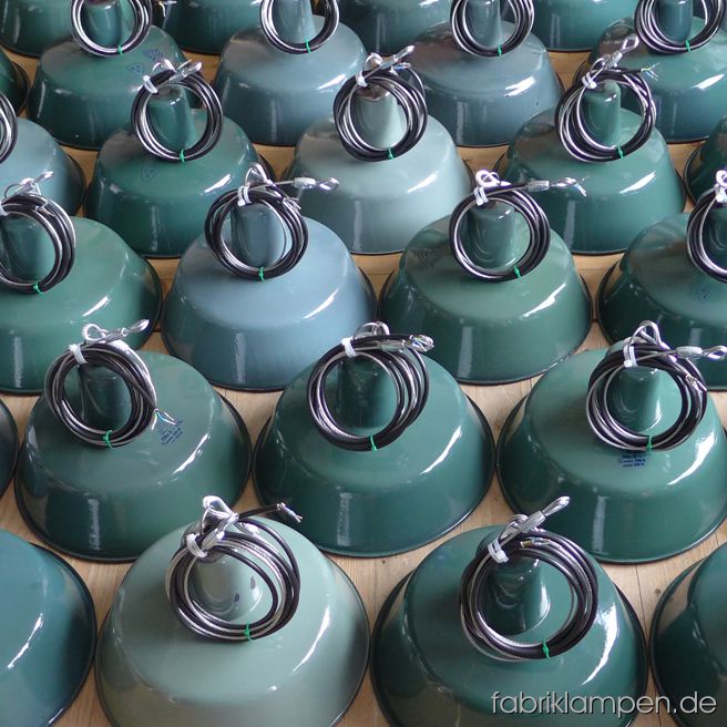 Nice collection of green enamel lamps for a restaurant in Osnabrück.