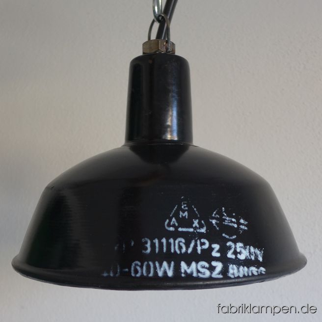 Black enamel industrial lamp with white inscriptions. The lamps have the traces of age and usage. Material: black (inside white) enameled steel sheet. Cleaned, newly electrified, with E27 porcelain bulbholders. Height of the lamp is ca. 18 cm (7 inches), diameter of the shade is ca. 26 cm (10,2 inches). 