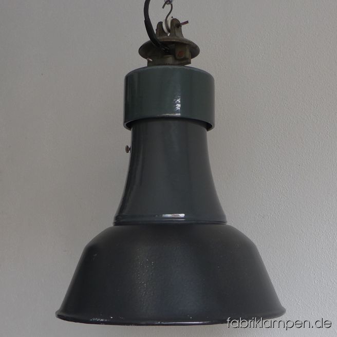 Old gray enamel industrial lamp, three-piece with enamel shades in various hues of gray. Made in Germany. Material: gray (top in dark green, inside white) enameled steel sheet. Good preserved, with minimal traces of age and usage. Cleaned, newly electrified, with E27 ceramic socket. Height of the lamp ca. 41 cm (16,1 inches), diameter of the shades ca. 36 cm (14,2 inches). The lamp will be shipped with 2 m cable and hanging eye. Chain suspension is possible for an additional charge. 