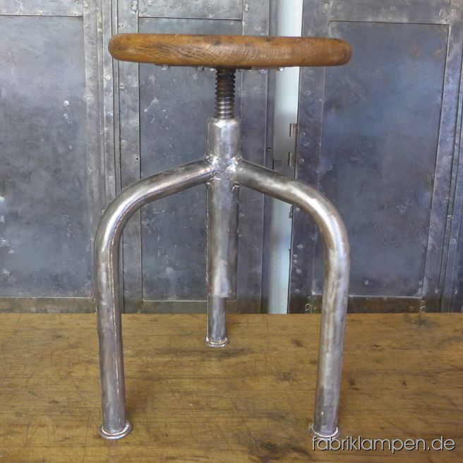 Very nice old industrial stool with oak sit. From about 1950. The pedestal is cleaned and conserved (here and there with remains of original white colour). The oak sit is waxed. The oak massive sit is 3,5 cm (1,4 inches) thick, the diameter amounts to 32 cm (12,6 inches). Everlasting, suitable for gastronomy or for your loft-kitchen. Sitting height from 48 to 69 cm. 