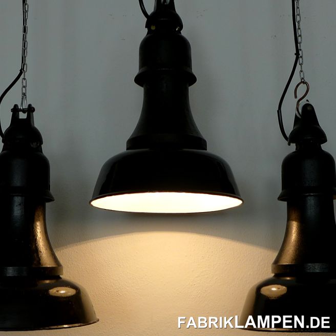Some pictures from our work in January 2020.Old factory lamps from the 1920s, restored and equipped with black and white textile cable. They are all with their new owners and shine like they have been for almost 100 years.An industrial table with cast iron feet and solid top - we have many tables like this, in different sizes, all original, with a beautiful patina. Weight from 100 kg. Old headlights, also prepared, for a classic car garage before shipping to Switzerland.We got three rather large copper plates from an old department store.A still life with old industrial lamps and some pieces of furniture. 
